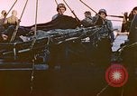 Image of Iwo Jima wounded hoisted onto LST Iwo Jima, 1945, second 20 stock footage video 65675029321