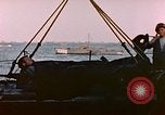 Image of Iwo Jima wounded hoisted onto LST Iwo Jima, 1945, second 24 stock footage video 65675029321