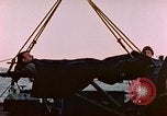 Image of Iwo Jima wounded hoisted onto LST Iwo Jima, 1945, second 25 stock footage video 65675029321