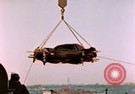 Image of Iwo Jima wounded hoisted onto LST Iwo Jima, 1945, second 31 stock footage video 65675029321