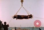 Image of Iwo Jima wounded hoisted onto LST Iwo Jima, 1945, second 32 stock footage video 65675029321