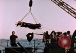 Image of Iwo Jima wounded hoisted onto LST Iwo Jima, 1945, second 38 stock footage video 65675029321