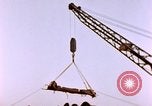 Image of Iwo Jima wounded hoisted onto LST Iwo Jima, 1945, second 59 stock footage video 65675029321