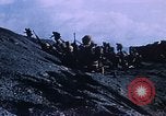 Immagine di Il sollevamento della bandiera americana di Iwo Jima Iwo Jima, 1945, secondo 25 filmato di repertorio 65675029325