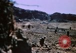 Standbild Artillerie Beschuss Iwo Jima, 1945, aus Sekunde 58 historischem Filmmaterial Videoclip 65675029326