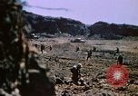 Standbild Artillerie Beschuss Iwo Jima, 1945, aus Sekunde 59 historischem Filmmaterial Videoclip 65675029326