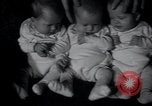 Image of triplets Chicago Illinois USA, 1932, second 13 stock footage video 65675029419