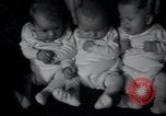 Image of triplets Chicago Illinois USA, 1932, second 14 stock footage video 65675029419