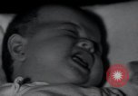 Image of triplets Chicago Illinois USA, 1932, second 17 stock footage video 65675029419
