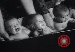 Image of triplets Chicago Illinois USA, 1932, second 27 stock footage video 65675029419