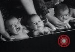 Image of triplets Chicago Illinois USA, 1932, second 28 stock footage video 65675029419