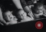 Image of triplets Chicago Illinois USA, 1932, second 29 stock footage video 65675029419