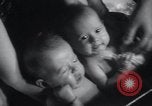 Image of triplets Chicago Illinois USA, 1932, second 31 stock footage video 65675029419
