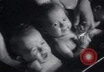 Image of triplets Chicago Illinois USA, 1932, second 32 stock footage video 65675029419