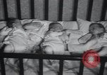 Image of triplets Chicago Illinois USA, 1932, second 49 stock footage video 65675029419