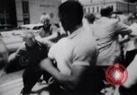 Image of School racial integration street fights Little Rock Arkansas USA, 1957, second 5 stock footage video 65675029483