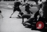 Image of School racial integration street fights Little Rock Arkansas USA, 1957, second 11 stock footage video 65675029483