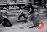Image of School racial integration street fights Little Rock Arkansas USA, 1957, second 16 stock footage video 65675029483