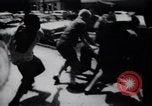 Image of School racial integration street fights Little Rock Arkansas USA, 1957, second 20 stock footage video 65675029483