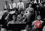 Image of African American youth orchestra and chorus Arkansas United States USA, 1968, second 36 stock footage video 65675029499