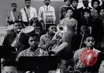 Image of African American youth orchestra and chorus Arkansas United States USA, 1968, second 49 stock footage video 65675029499