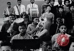 Image of African American youth orchestra and chorus Arkansas United States USA, 1968, second 50 stock footage video 65675029499