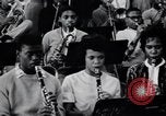 Image of African American youth orchestra and chorus Arkansas United States USA, 1968, second 59 stock footage video 65675029499