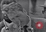 Image acteur Ossie Davis introduisant Burt Lancaster Washington DC USA, 1963, de la seconde 48 séquences d'archives historiques vidéo 65675029518