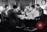 Image of British and American factory counterpart workers on international exchange visit to the United States Los Angeles California USA, 1944, second 4 stock footage video 65675029527