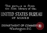 Image of drawing steel rod through die into wires at factory United States USA, 1924, second 7 stock footage video 65675029554