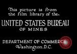 Image of drawing steel rod through die into wires at factory United States USA, 1924, second 8 stock footage video 65675029554