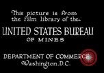 Image of drawing steel rod through die into wires at factory United States USA, 1924, second 13 stock footage video 65675029554