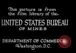 Image of drawing steel rod through die into wires at factory United States USA, 1924, second 16 stock footage video 65675029554