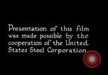Image of drawing steel rod through die into wires at factory United States USA, 1924, second 22 stock footage video 65675029554