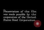 Image of drawing steel rod through die into wires at factory United States USA, 1924, second 27 stock footage video 65675029554