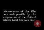 Image of drawing steel rod through die into wires at factory United States USA, 1924, second 28 stock footage video 65675029554