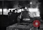 Image of drawing steel rod through die into wires at factory United States USA, 1924, second 61 stock footage video 65675029554