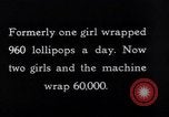 Image of wrapping lollipops United States USA, 1931, second 15 stock footage video 65675029570