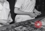 Image of wrapping lollipops United States USA, 1931, second 22 stock footage video 65675029570