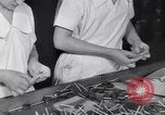 Image of wrapping lollipops United States USA, 1931, second 23 stock footage video 65675029570