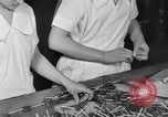 Image of wrapping lollipops United States USA, 1931, second 25 stock footage video 65675029570