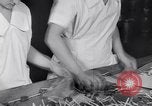 Image of wrapping lollipops United States USA, 1931, second 26 stock footage video 65675029570