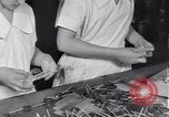 Image of wrapping lollipops United States USA, 1931, second 27 stock footage video 65675029570