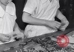Image of wrapping lollipops United States USA, 1931, second 28 stock footage video 65675029570