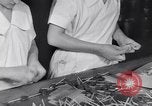 Image of wrapping lollipops United States USA, 1931, second 29 stock footage video 65675029570