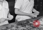 Image of wrapping lollipops United States USA, 1931, second 31 stock footage video 65675029570
