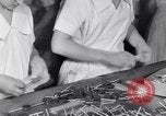 Image of wrapping lollipops United States USA, 1931, second 34 stock footage video 65675029570