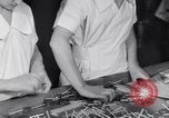Image of wrapping lollipops United States USA, 1931, second 35 stock footage video 65675029570