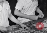Image of wrapping lollipops United States USA, 1931, second 38 stock footage video 65675029570