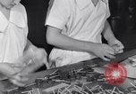 Image of wrapping lollipops United States USA, 1931, second 39 stock footage video 65675029570